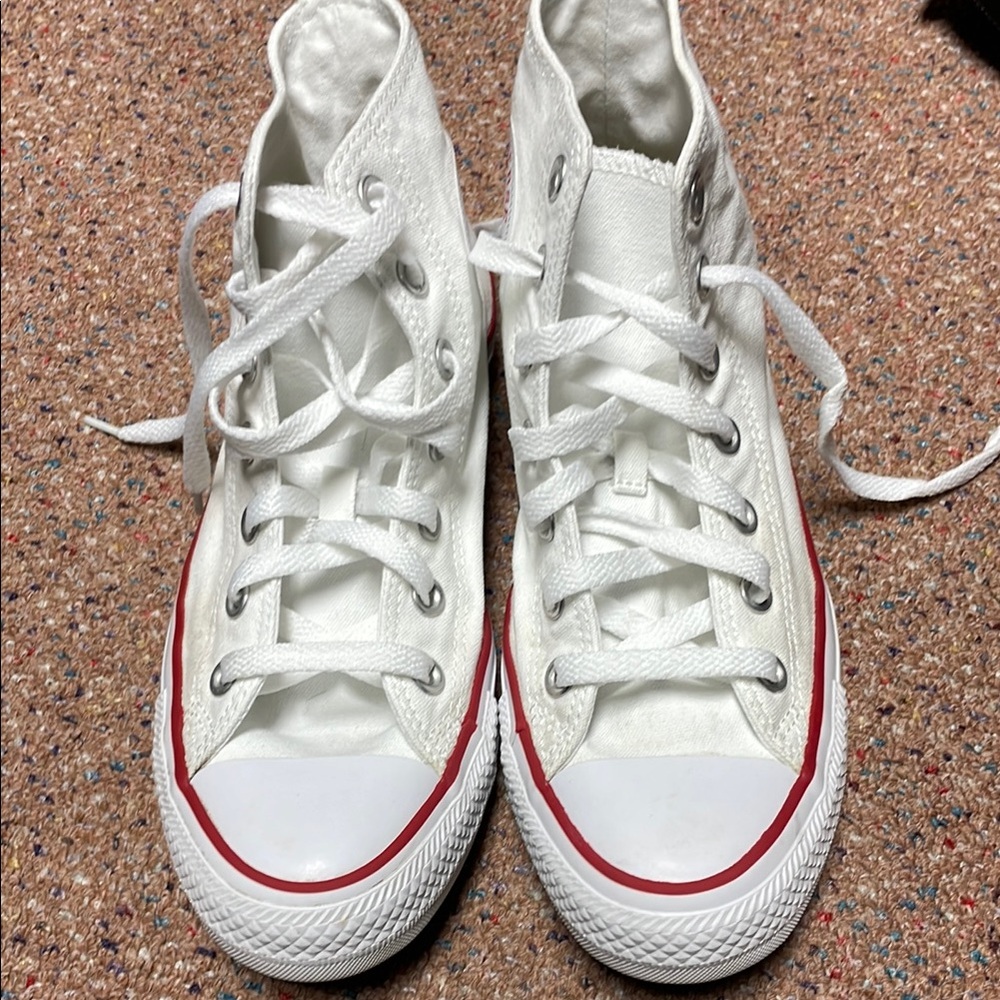 Converse High-Top White with Red stripe sneakers.